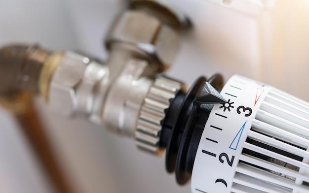 How do you adjust an adjustable proportioning valve? 