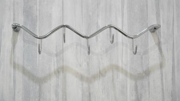 Can I glue a towel rack to drywall? 