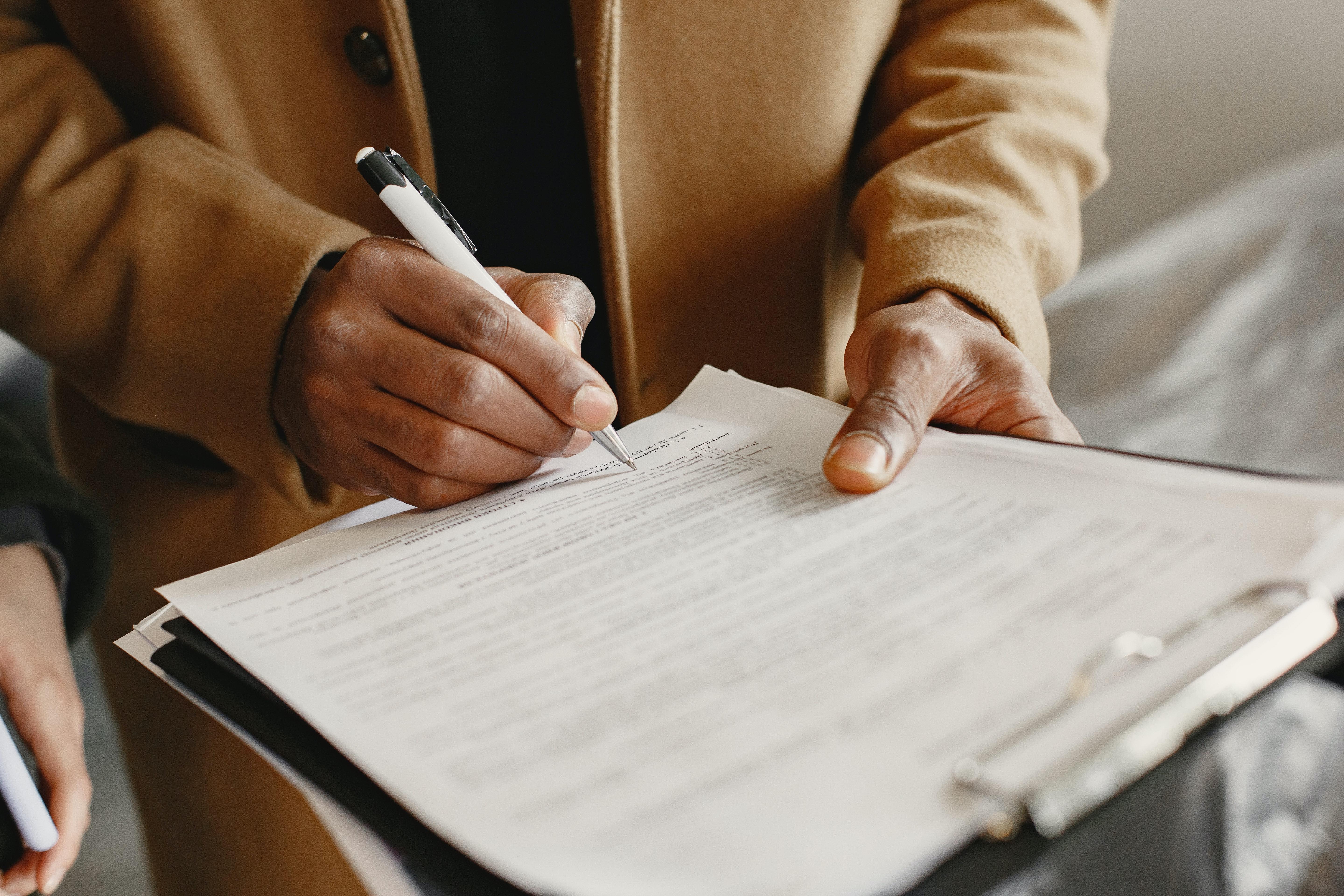 How do you sign on behalf of someone? 