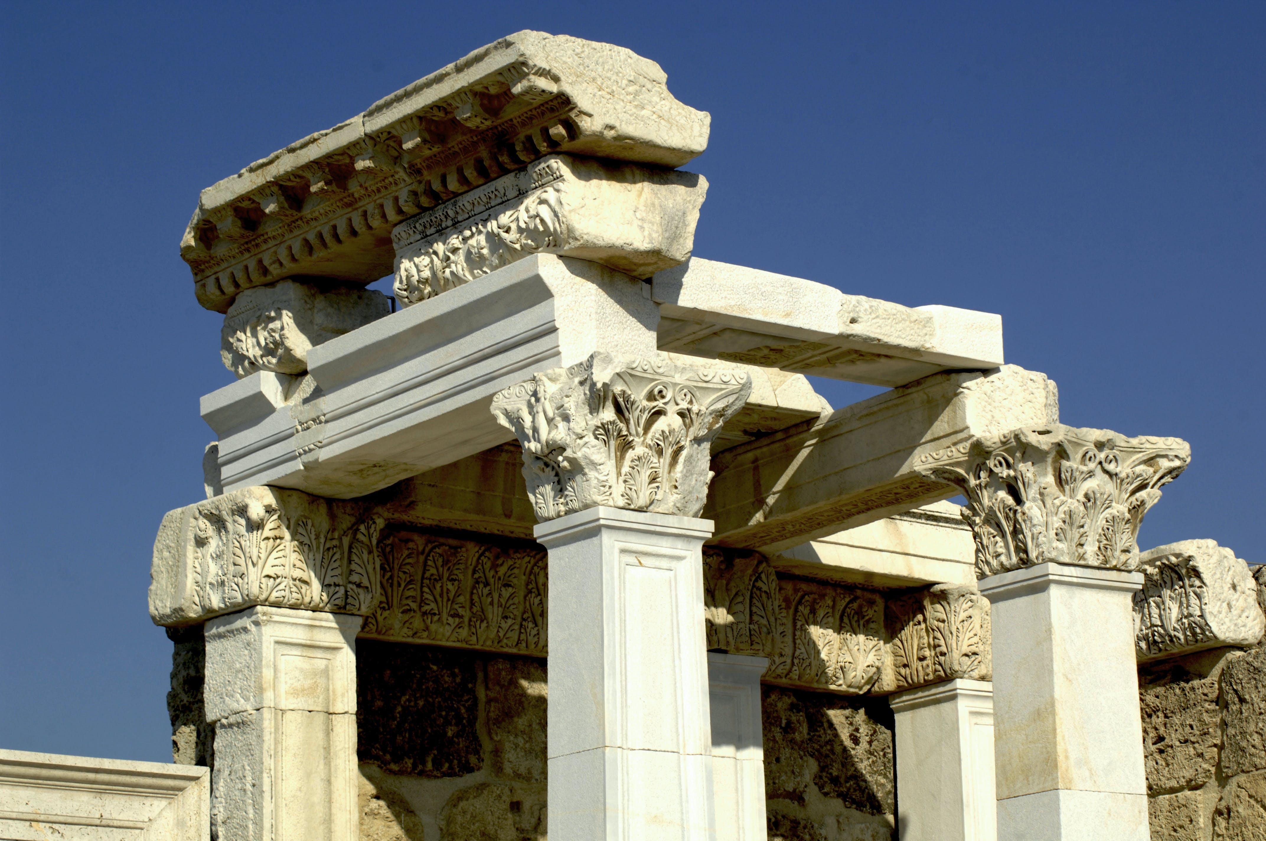 How did the Romans improve on Greek architecture? 