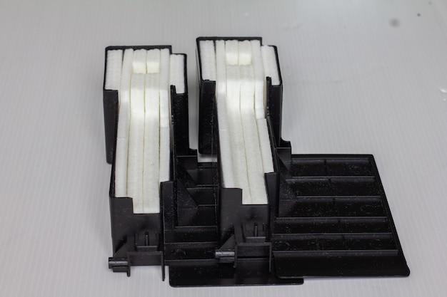 How do you clear a Canon ink absorber? 