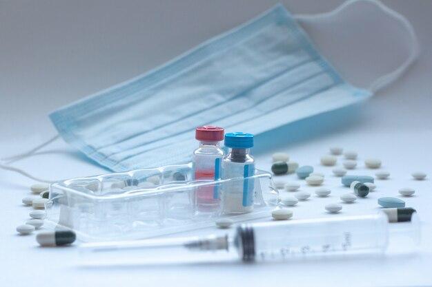 How do you draw up a medicine from two vials? 