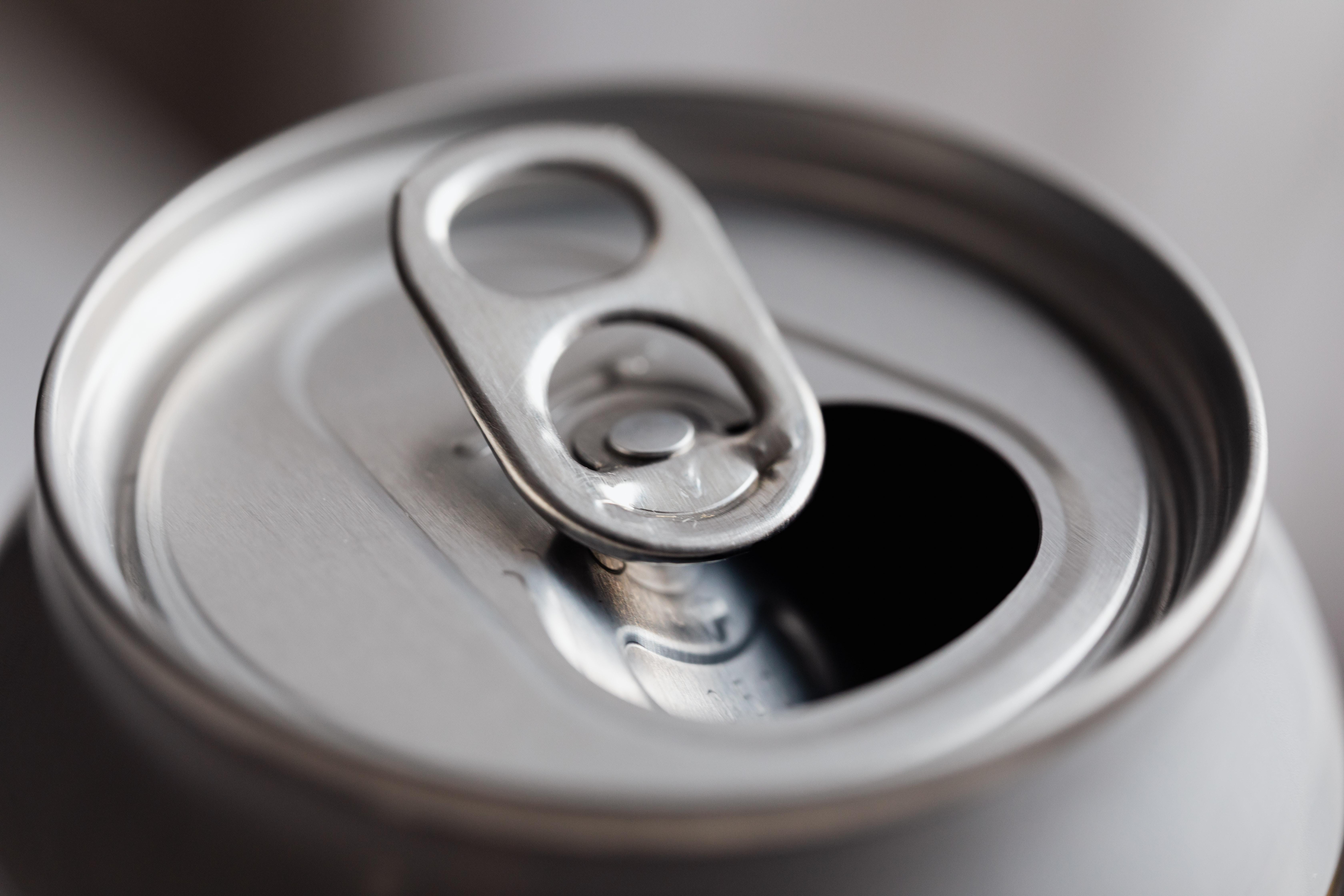 How do you open a soda can silently? 
