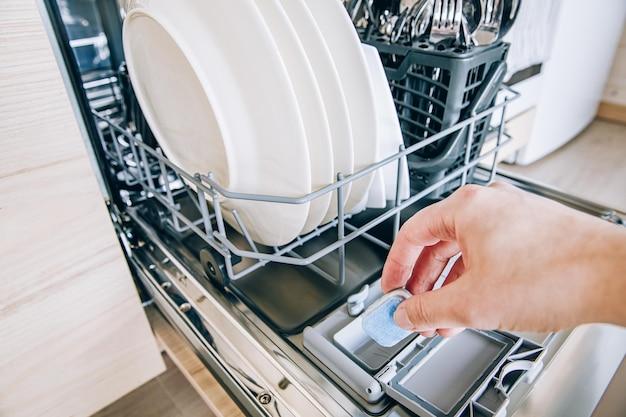 How do I put detergent in my Maytag dishwasher? 