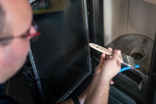 How do you remove the top panel on a Bosch dishwasher? 
