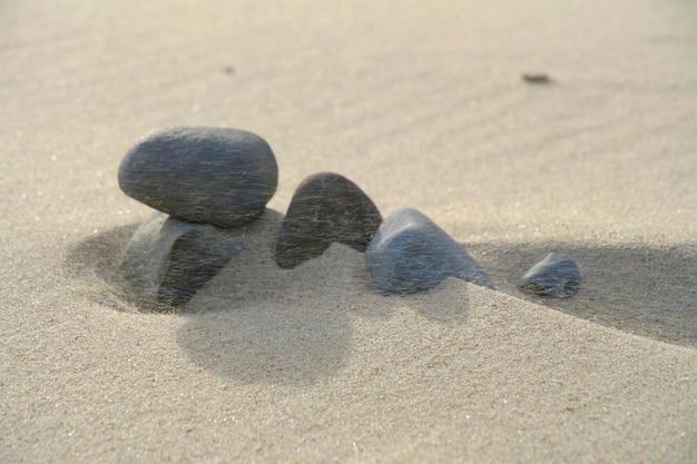 Is stone or sand heavier? 