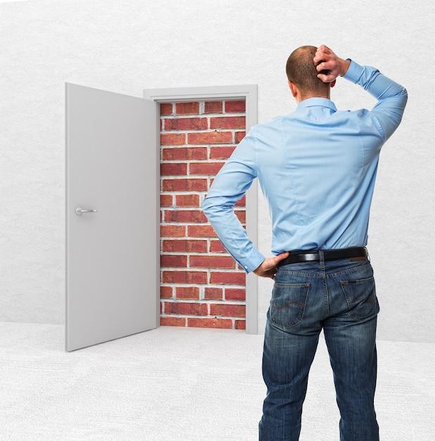 Where should you look when you are backing in a straight line? 
