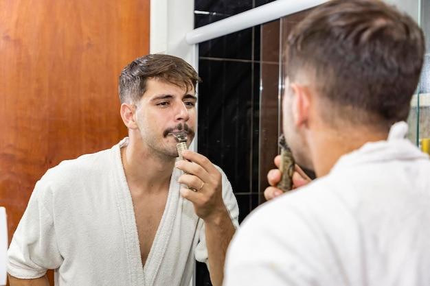 Should a 12 year old boy shave his mustache? 