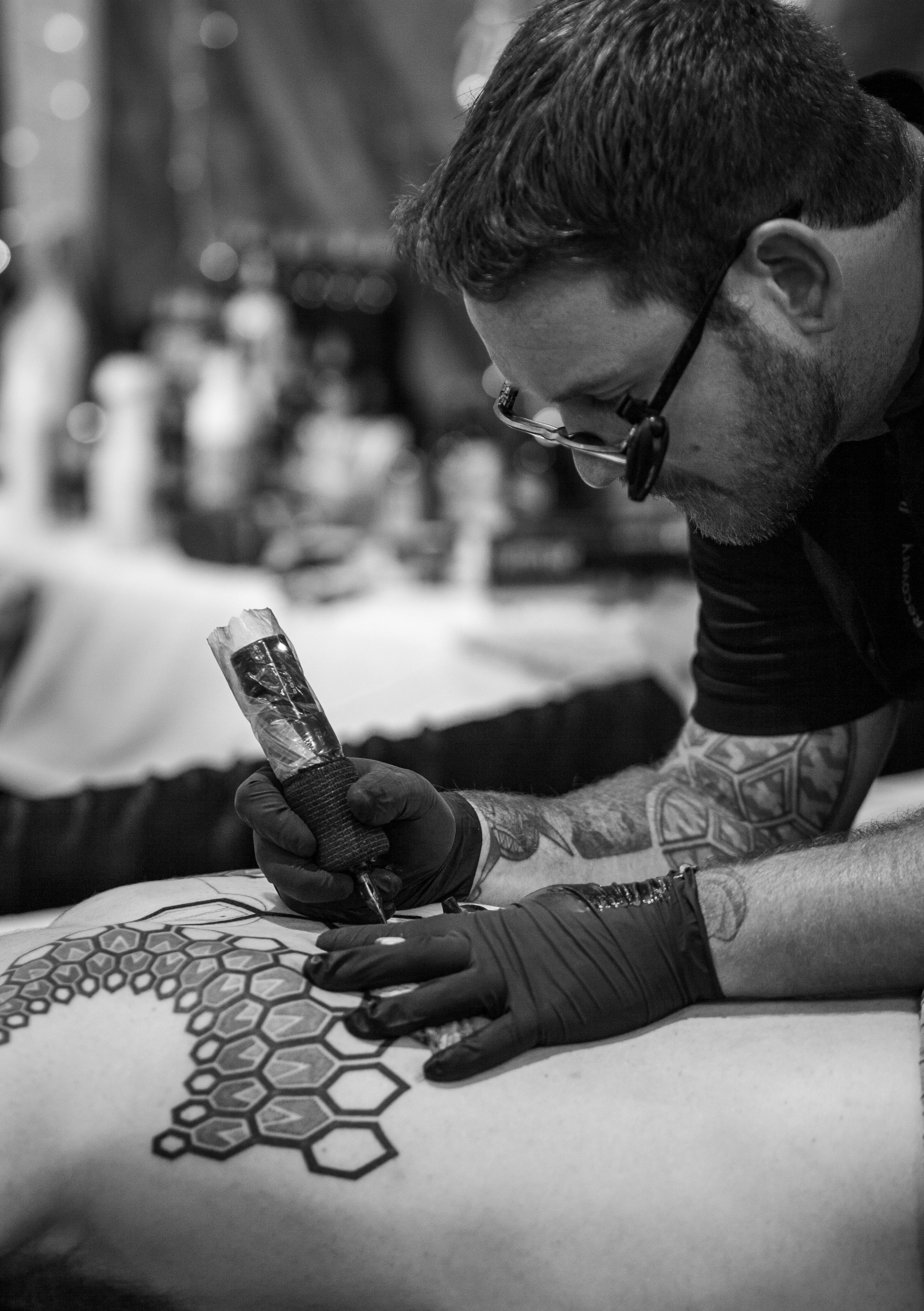 Should I cover my fresh tattoo at work? 