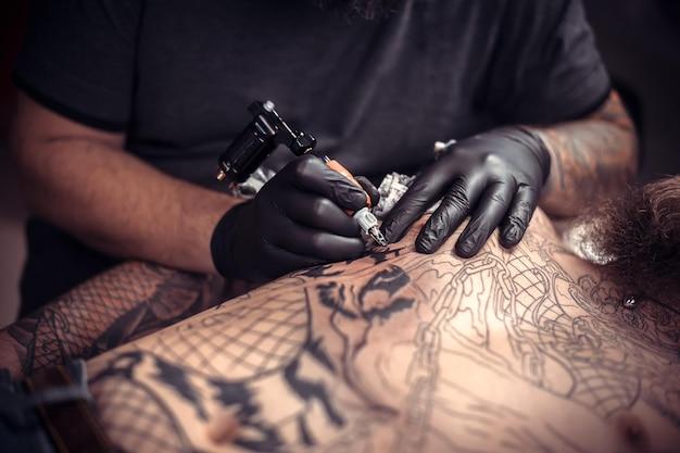 Should I cover my fresh tattoo at work? 