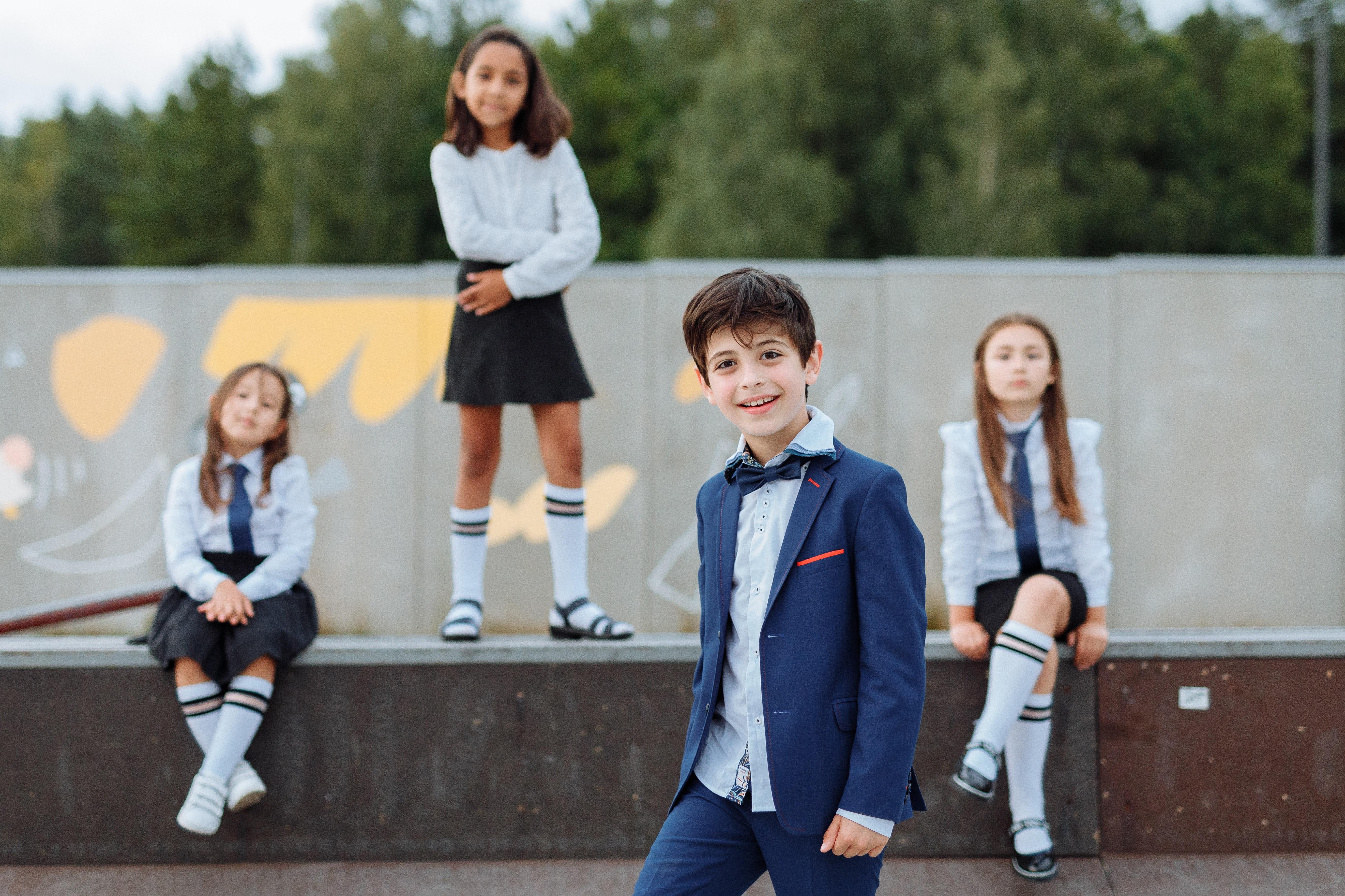 What are reasons why students should not wear uniforms? 