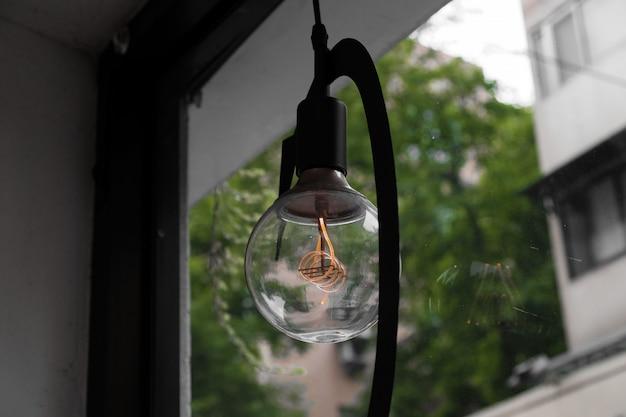 How do you test an outdoor light fixture with a multimeter? 