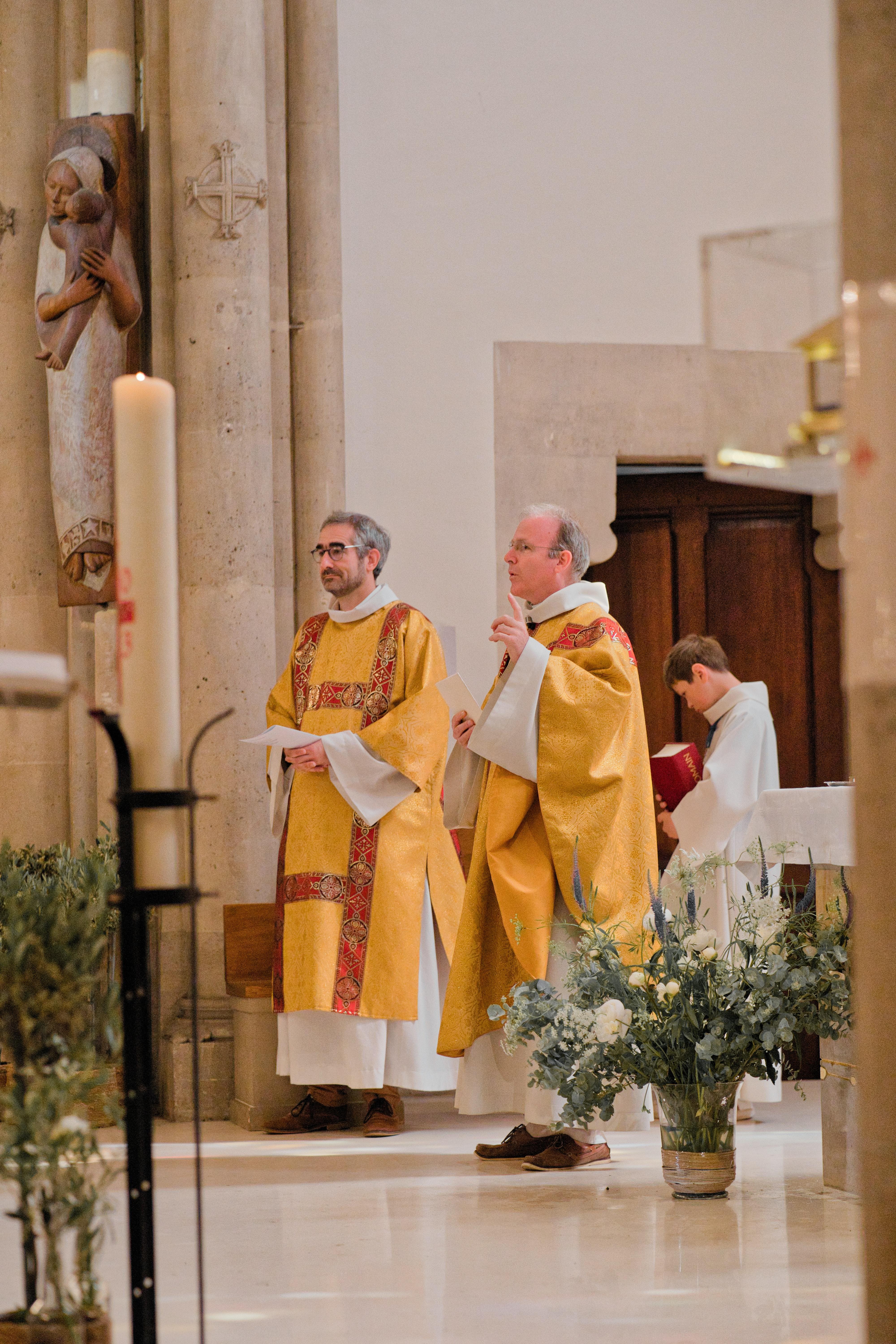 What are the two types of priests in the Catholic Church? 