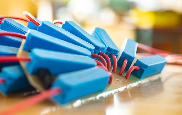 What are conductor and insulator give one example each? 