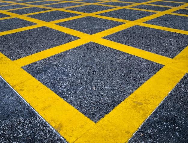 What do diagonal yellow stripes on the road mean? 