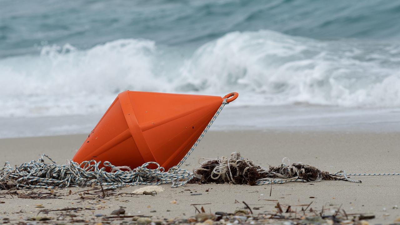 What do you do when you see a red lighted buoy with the number 6? 