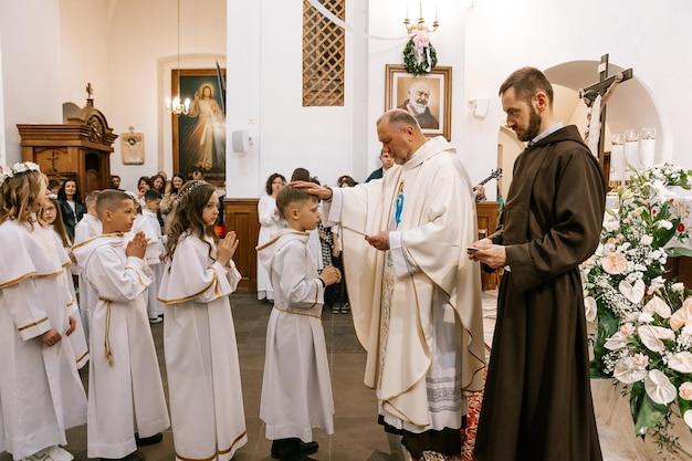 What do you say when receiving Holy Communion? 