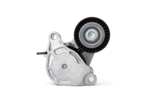 Where is the belt tensioner located? 