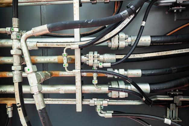 Where is the power steering high-pressure hose located? 