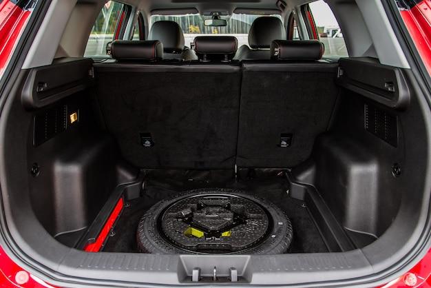Where is the spare tire located in a Honda Odyssey? 