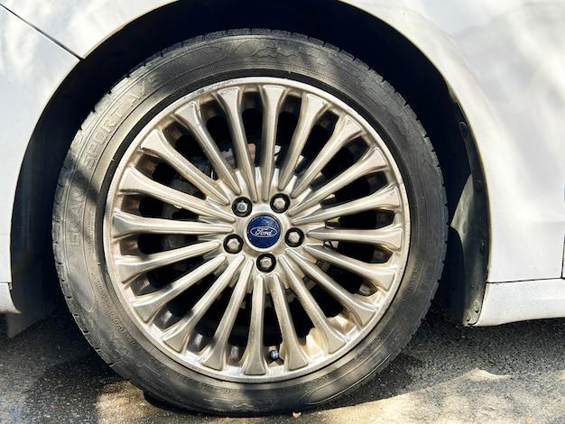 Where is the starter on Ford Fusion? 