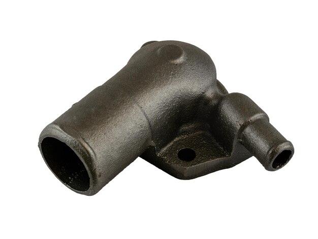 Where is the thermostat housing? 