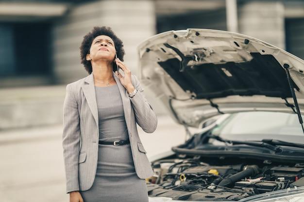 When vehicle breakdown occurs it is recommended to place? 