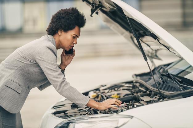 When vehicle breakdown occurs it is recommended to place? 
