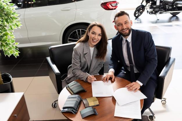 Who is the boss at a car dealership? 