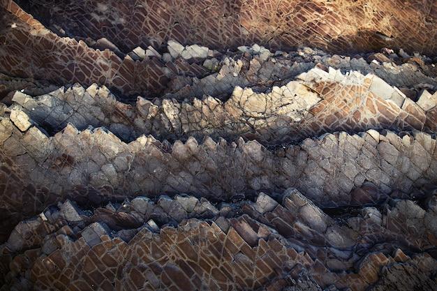 Why would granite have larger crystals than igneous rocks? 