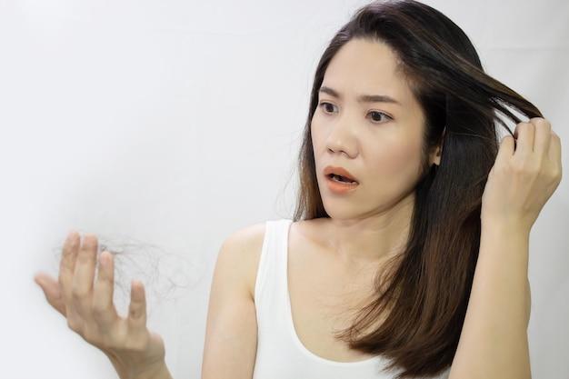 Why does my skin itch when my hair touches it? 
